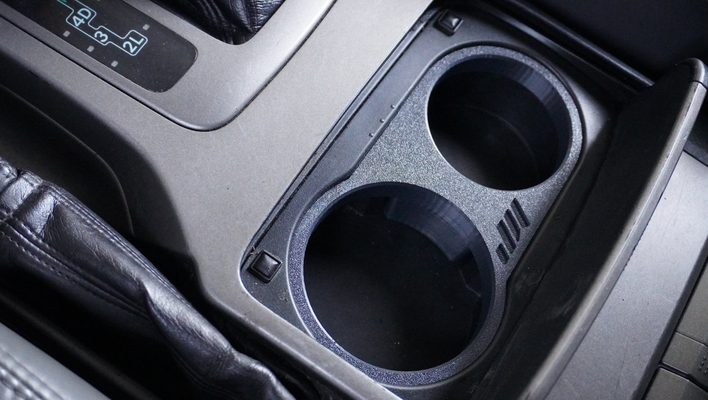 GX470 CUP HOLDER INSERT