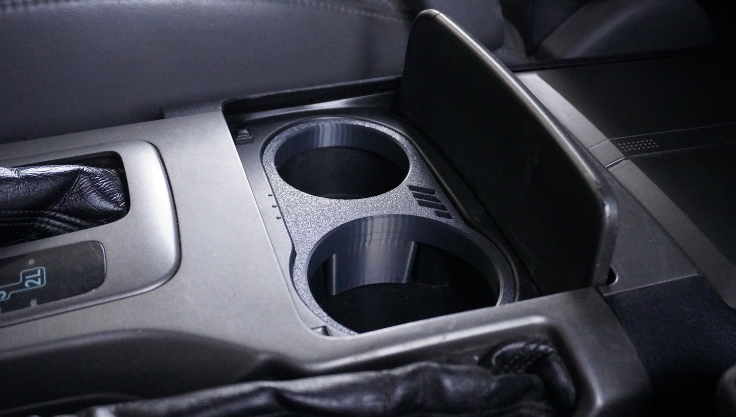 GX470 CUP HOLDER INSERT
