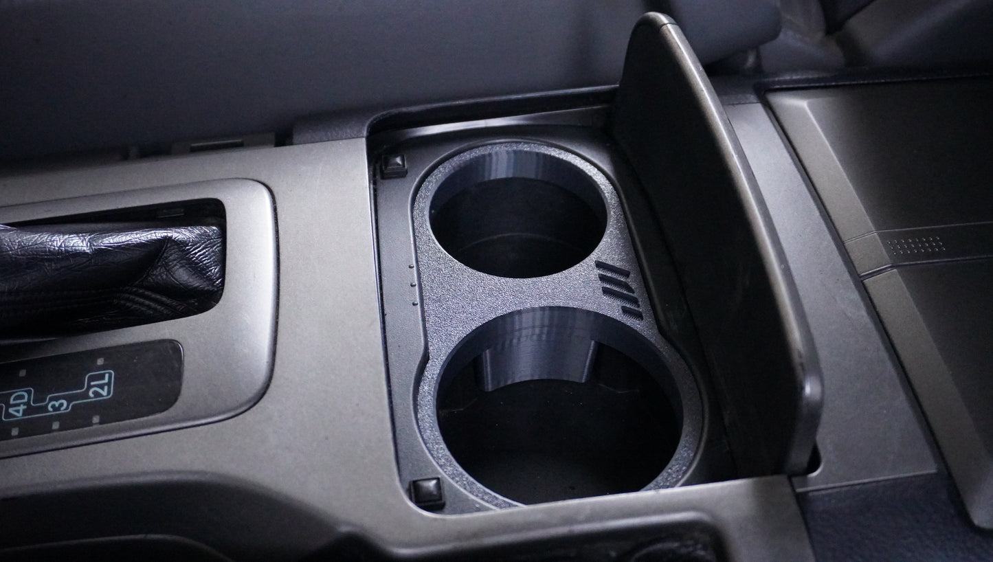 GX470 CUP HOLDER INSERT